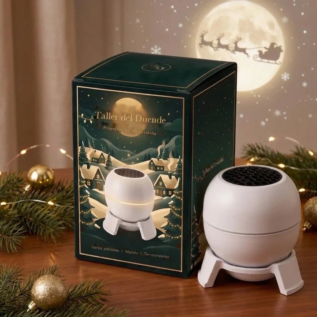 Taller del Duende projector next to its gift box with the moon and Santa's sleigh